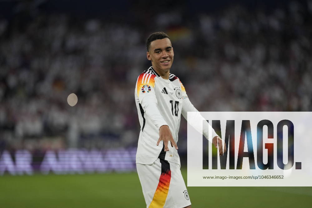 EURO 2024 - Matchday 1: Germany vs. Scotland Jamal Musiala scores and celebrates with his teammates during the EURO 2024 Day 1 opening match between Germany and Scotland on 14 June 2024, at Munich Football Arena, in Munich, Germany Munich Munich Football Arena Germany
