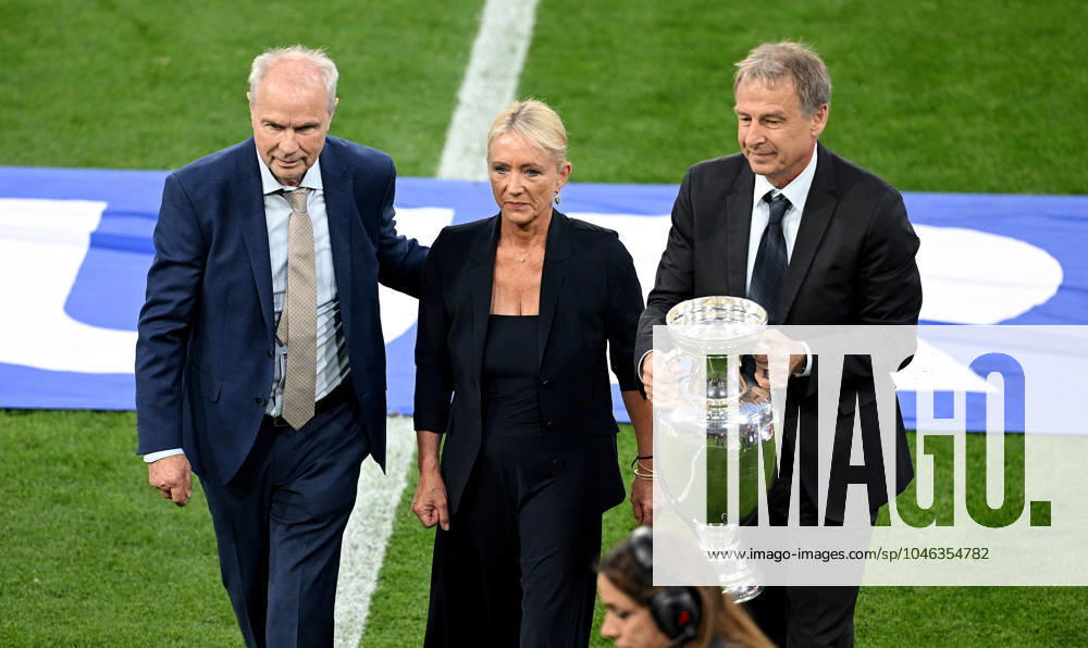 Football Euro 2024 opening match Group A 14 06 2024 Germany Scotland Opening ceremony in the arena in Munich Heidi Beckenbauer in the middle of the European Championship trophy in the arena in Munich, accompanied by captains of the 1980 European Championship titles, Bernard Dietz left and 1996, Juergen Klinsmann right