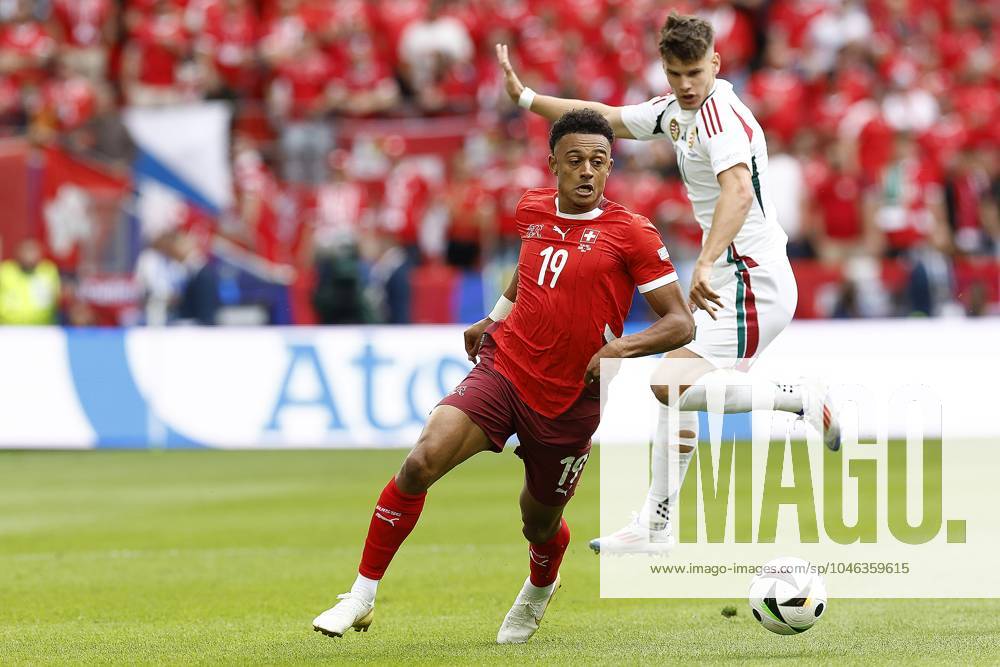 COLOGNE, RheinEnergie Stadium, 15-06-2024 , European Football Championship Euro2024, Group stage match no.2 between Hungary and Switzerland. Hungary player Milos Kerkez and Switzerland player Dan Ndoye Hungary - Switzerland (Euro2024) x25494506x