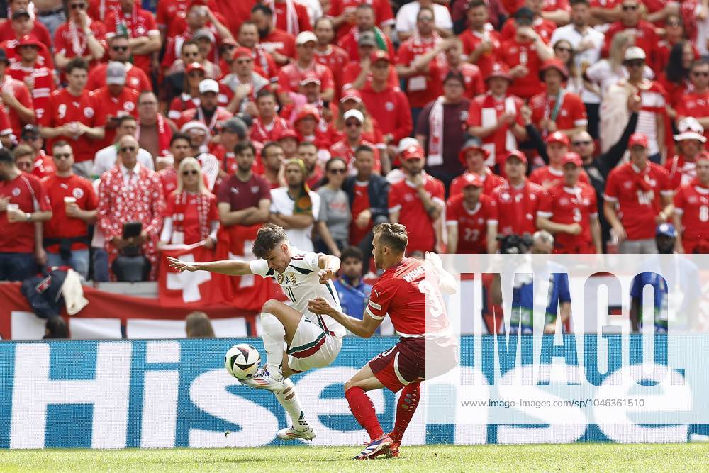 COLOGNE, RheinEnergie Stadium, 15-06-2024 , European Football Championship Euro2024, Group stage match no.2 between Hungary and Switzerland. Hungary player Milos Kerkez and Switzerland player Silvan Widmer Hungary - Switzerland (Euro2024) x25494991x