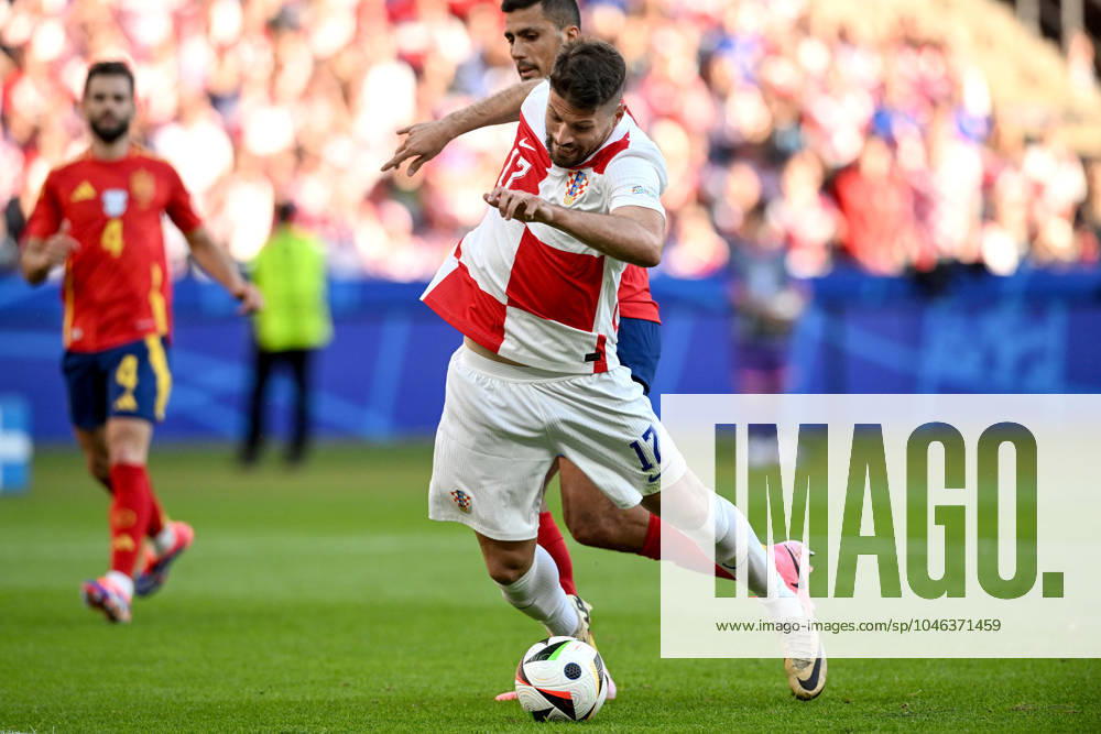 Spain v Croatia: Group B - UEFA EURO, EM, Europameisterschaft,Fussball 2024 BERLIN, GERMANY - JUNE 15: Bruno Petkovic of Croatia is fouled by Rodri of Spain during the UEFA EURO 2024 group stage match between Spain and Croatia at Olympiastadion on June 15, 2024 in Berlin, Germany. MarkoxLukunic PIXSELL