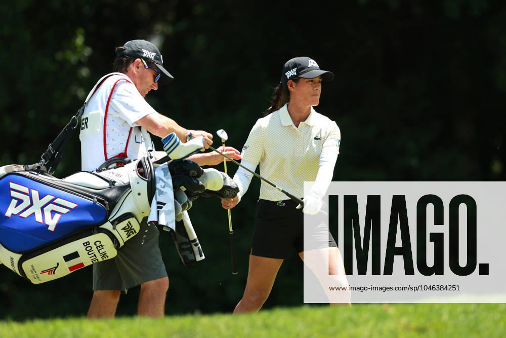 Meijer LPGA, Golf Damen Classic Celine Boutier of France hands her club to her caddie on the 12th hole during Day Three of the Meijer LPGA Classic for Simply Give golf tournament at Blythefield Country Club in Belmont, MI, USA Saturday, June 15, 2024. Belmont Michigan United States