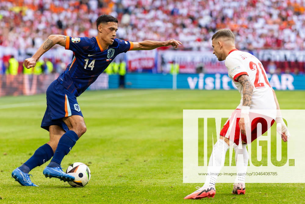 Poland v Netherlands - UEFA EURO, EM, Europameisterschaft,Fussball 2024 Tijjani Reijnders, Sebastian Szymanski are playing during the UEFA Euro 2024 Group D match between Poland v Netherlands, at the stadium in Hamburg, Germany, on June 16, 2024. Hamburg Germany