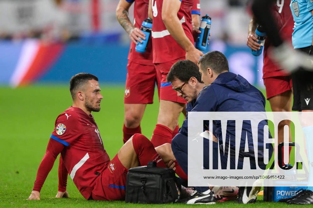 Soccer, UEFA EURO 2024, 20240616, Serbia England In the picture Filip KOSTIC Serbia, 11 battered on the ground being treated Gelsenkirchen Arena auf Schalke North Rhine-Westphalia Germany