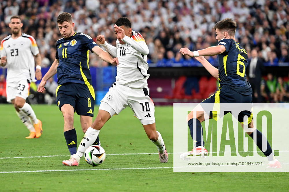 Football EM 2024, Germany Scotland, v l Ryan Christie Team Scotland Jamal Musiala Deutsche Fussball Nationalmannschaft DFB Kieran Tierney Team Scotland Zweikampf, Aktion, action, battle for the ball Munich