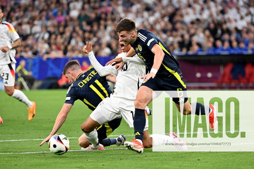Football EM 2024, Germany Scotland, v l Ryan Christie Team Scotland Jamal Musiala Deutsche Fussball Nationalmannschaft DFB Kieran Tierney Team Scotland Zweikampf, Aktion, action, battle for the ball Munich