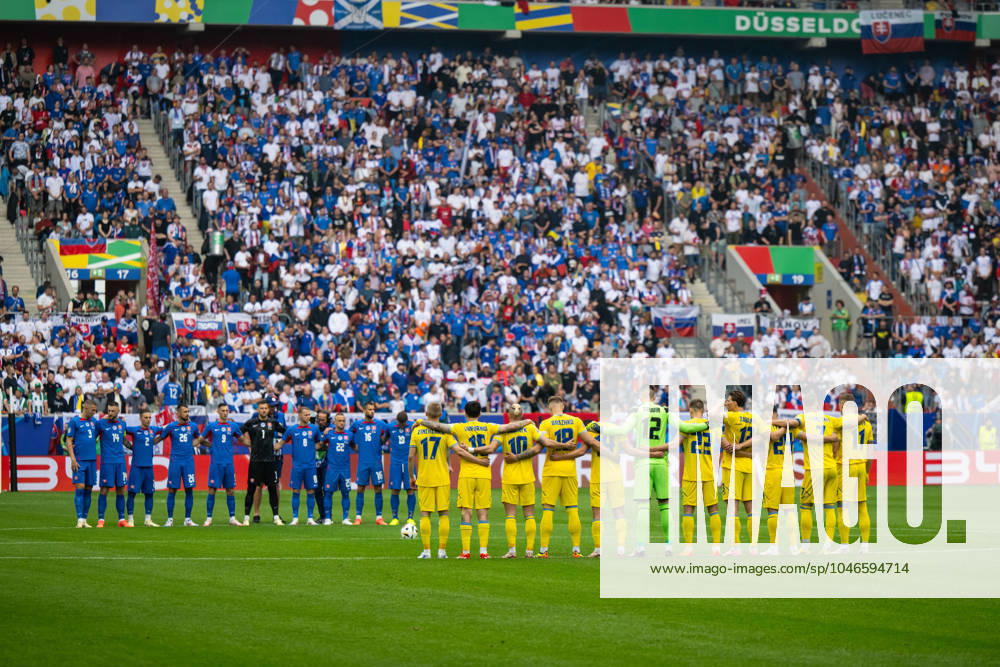 Slovakia v Ukraine: Group E - UEFA EURO, EM, Europameisterschaft,Fussball 2024 Players of Slovakia and Ukraine are taking part in a minute of silence during the UEFA EURO 2024 group stage match between Slovakia and Ukraine at Düsseldorf Arena on June 21, 2024 in Dusseldorf, Germany. Duesseldorf Germany
