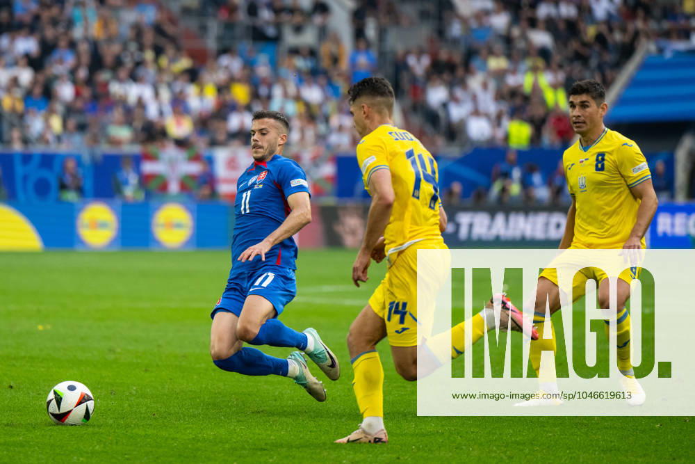 Slovakia v Ukraine: Group E - UEFA EURO, EM, Europameisterschaft,Fussball 2024 Laszlo Benes of Slovakia is playing against Georgiy Sudakov of Ukraine during the UEFA EURO 2024 group stage match between Slovakia and Ukraine at D¸sseldorf Arena on June 21, 2024 in Dusseldorf, Germany. Duesseldorf Germany