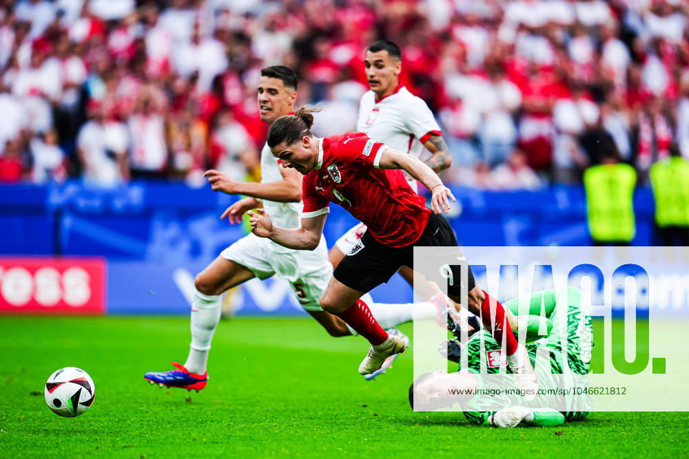 Foul Wojciech Szczesny Poland, 01 on Marcel Sabitzer Austria, 09 , Penalty kick GER, Poland vs Austria, European Football Championship, UEFA Euro 2024, Matchday 2, 21 06 2024 GER, Poland vs Austria, European Football Championship, UEFA Euro 2024, Matchday 2, 21 06 2024 Berlin