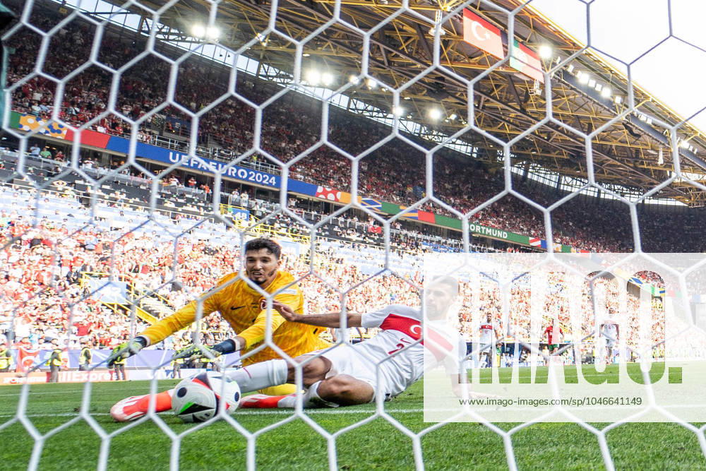 GER, Euro 2024, Group F, Turkey TUR vs Portugal PRT , 22 06 2024, BVB Stadion Dortmund Signal Iduna Park, Dortmund, GER, Euro 2024, Group F, Turkey TUR vs Portugal PRT , In the picture Goal for 2 0 own goal Bayindir Altay Turkey TUR Turkey TUR, 12 and Celik Mehmet Zeki Turkey TUR Turkey TUR, 2 try to save the ball, behind goal camera nordphotoxGmbHxx xChristianxSchulze nph000300