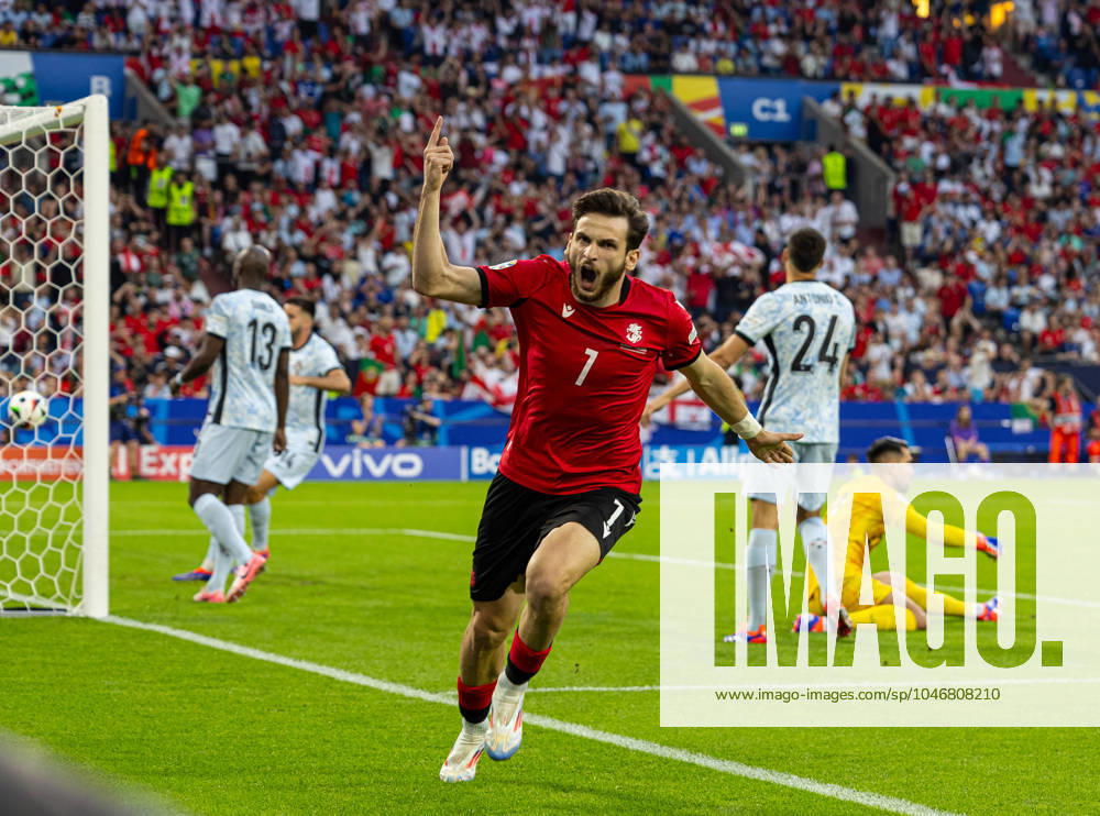 KW26 Football - UEFA EURO, EM, Europameisterschaft,Fussball 2024 - Group F - Georgia v Portugal GELSENKIRCHEN, GERMANY - Wednesday, June 26, 2024: Georgia s Khvicha Kvaratskhelia celebrates after scoring the opening goal during the UEFA Euro 2024 Group F match between Georgia and Portugal at the Arena AufSchalke. (Photo by David Rawcliffe Propaganda) GELSENKIRCHEN Arena AufSchalke NORTH RHINE-WESTPHALIA GERMANY