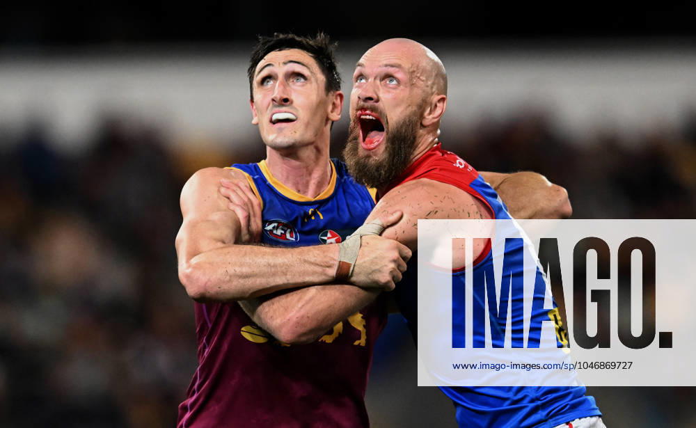 KW26 AFL LIONS DEMONS, Oscar McInerney (left) of the Lions and Max Gawn of the Melbourne Demons (right) contest for the ball during the AFL Round 16 match between the Brisbane Lions and the Melbourne Demons at The Gabba in Brisbane, Friday, June 28, 2024.( NO ARCHIVING, , NO USE IN BOOKS WITHOUT CONSENT BRISBANE QUEENSLAND AUSTRALIA