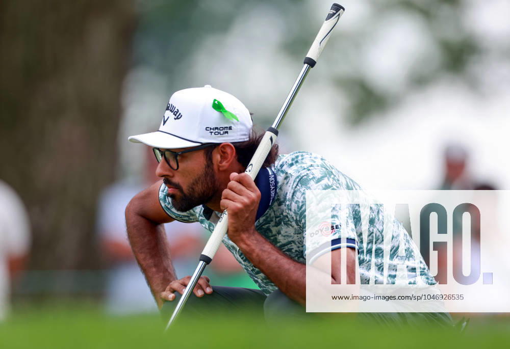 Rocket Mortgage Classic Akshay Bhatia of Raleigh, North Carolina lines up his putt on the 3rd green wearing a green ribbon in honor of PGA, Golf Herren professional Grayson Murray during the third round of the Rocket Mortgage Classic at Detroit Golf Club on Saturday, June 29, 2024 in Detroit, Michigan. Detroit Michigan United States