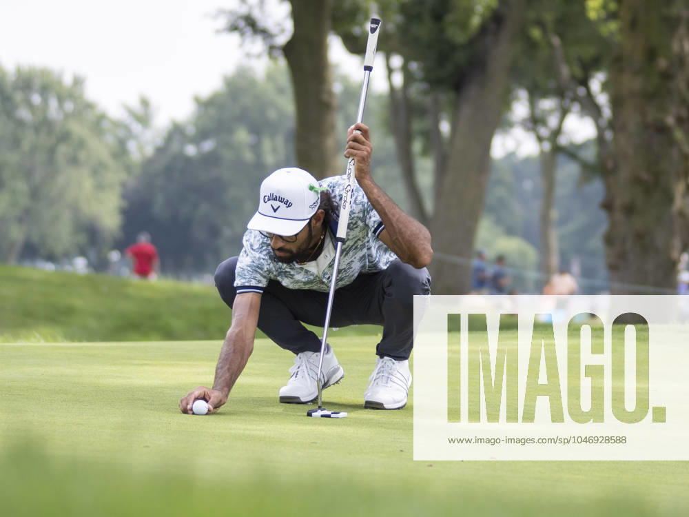DETROIT, MI - JUNE 29: Akshay Bhatia (USA) places his ball on the green during the third round of the Rocket Mortgage Classic on June 29, 2024 at Detroit Golf Club in Detroit, Michigan. (Photo by Joseph Weiser Icon Sportswire) GOLF: JUN 29 PGA, Golf Herren Rocket Mortgage Classic Icon2406290473
