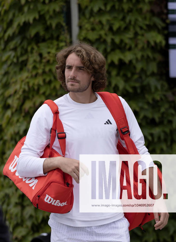 Stefanos Tsitsipas of Greece during warm up Wimbledon Tennis Championships, Practice and Previews, The All England Lawn Tennis and Croquet Club, London, UK - 30 Jun 2024