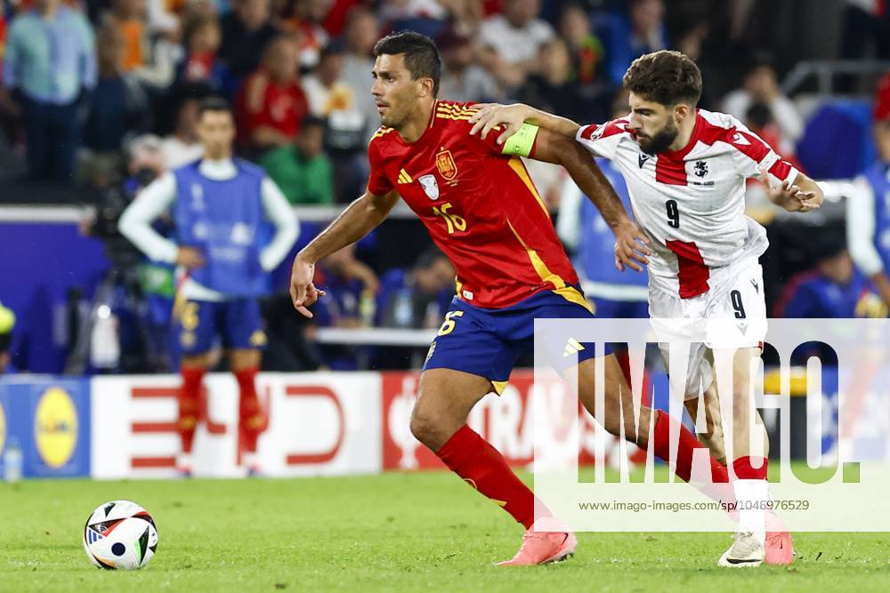 COLOGNE, RheinEnergie Stadium, 30-06-2024, European Football Championship Euro2024, round of 16 match no. 39 between Spain and Georgia. Spain player Rodrigo and Georgia player Zuriko Davitashvili Spain - Georgia (Euro2024) x25646005x