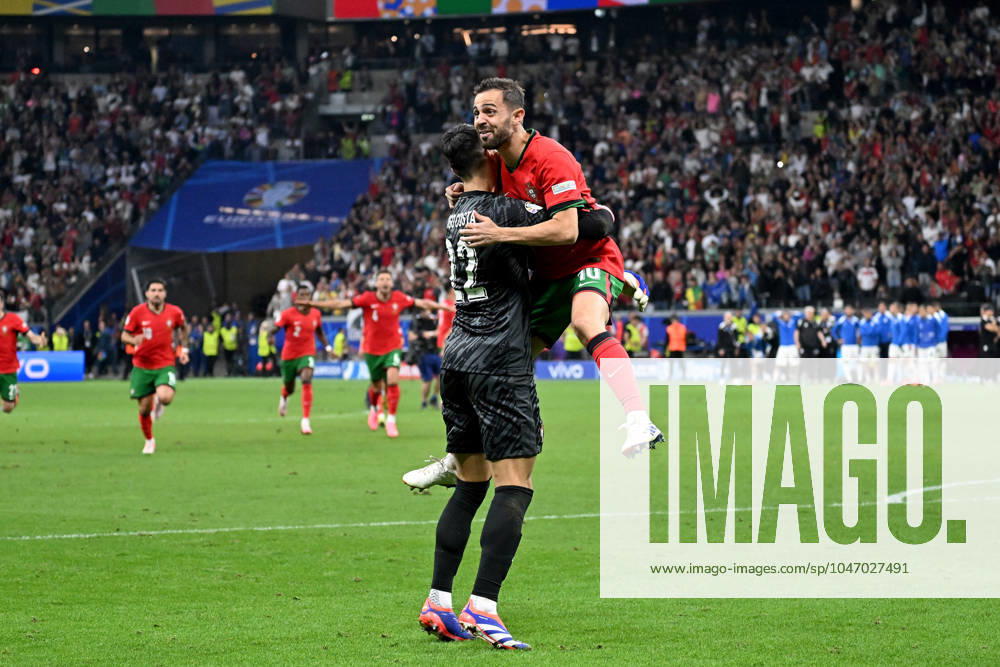 European Football Championship 2024 1 8 Final, Portugal Slovenia, v l jubilation, joy, emotions about the victory with Bernardo Mota Veiga de Carvalho E Silva Portugal and Diogo Meireles da Costa Portugal UEFA REGULATIONS PROHIBIT ANY USE OF PHOTOGRAPHS as IMAGE SEQUENCES and or QUASI VIDEO Frankfurt am Main