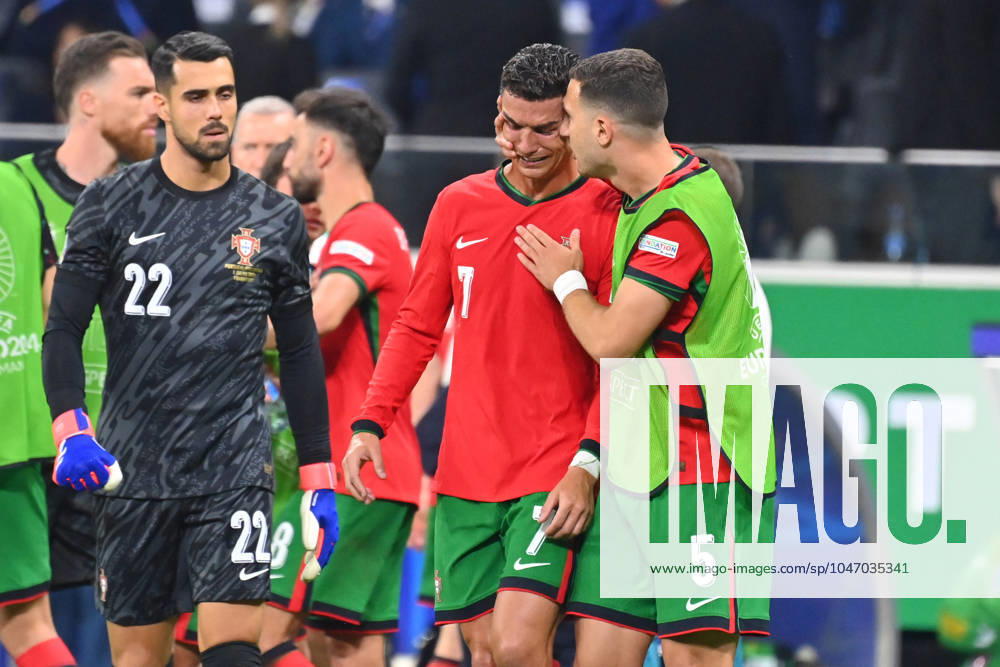 Cristiano RONALDO POR , crying after missing a penalty and before the start of extra time, is consoled by Diogo DALOT POR consolation Li goalkeeper DIOGO COSTA POR Round of 16 Portugal POR Slovenia SVN 3 0 i E on 01 07 2024, Frankfurt Arena Football UEFA EURO 2024 GERMANY from 14 06 2024 14 07 2024