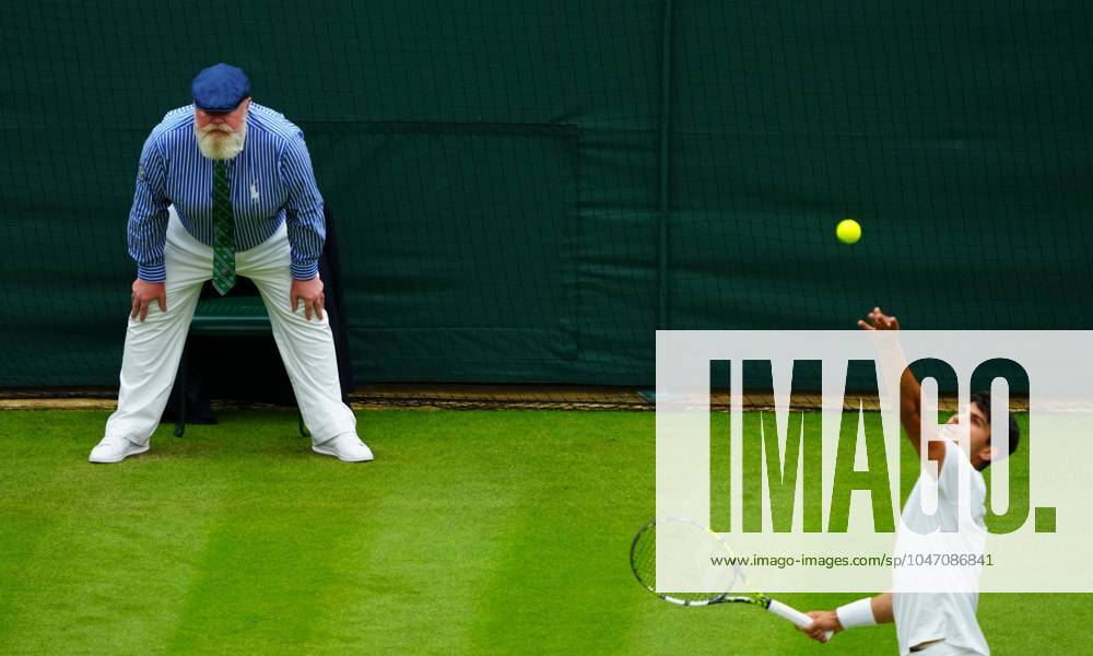 A line-judge looks on as Carlos Alcaraz serves Wimbledon Tennis Championships, Day 3, The All England Lawn Tennis and Croquet Club, London, UK - 03 Jul 2024