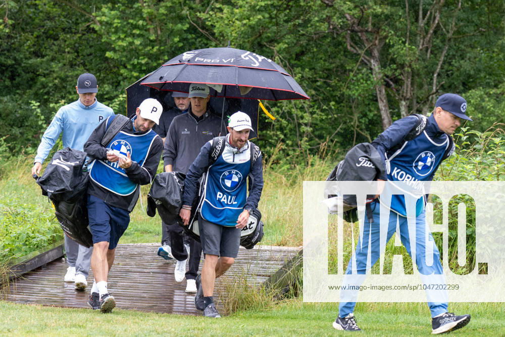 Matti Schmid, Mikko Korhonen and Jeremy Paul with the caddies on the way to the green, BMW International Open 2024, Golf, 07 07 2024 Munich Bavaria Germany