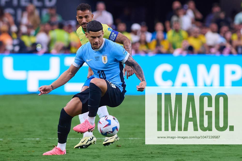 Copa America USA 2024 Uruguay (4p) 0-0 (2p) Brazil - Quarter-final Danilo (L) of Brazil fights for the ball with Maximiliano Araujo (R) of Uruguay during the CONMEBOL Copa America 2024 Quarter-final match between Uruguay and Brazil, at Allegiant Stadium, on July 06, 2024 in Las Vegas, Nevada, United States. LAS VEGAS NEVADA UNITED STATES