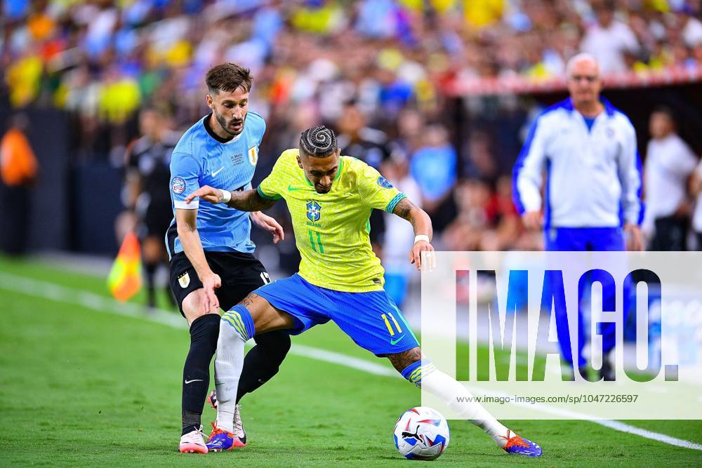 Copa America USA 2024 Uruguay (4p) 0-0 (2p) Brazil - Quarter-final Matias Vina (L) of Uruguay fights for the ball with Raphinha (R) of Brazil during the CONMEBOL Copa America 2024 Quarter-final match between Uruguay and Brazil, at Allegiant Stadium, on July 06, 2024 in Las Vegas, Nevada, United States. LAS VEGAS NEVADA UNITED STATES