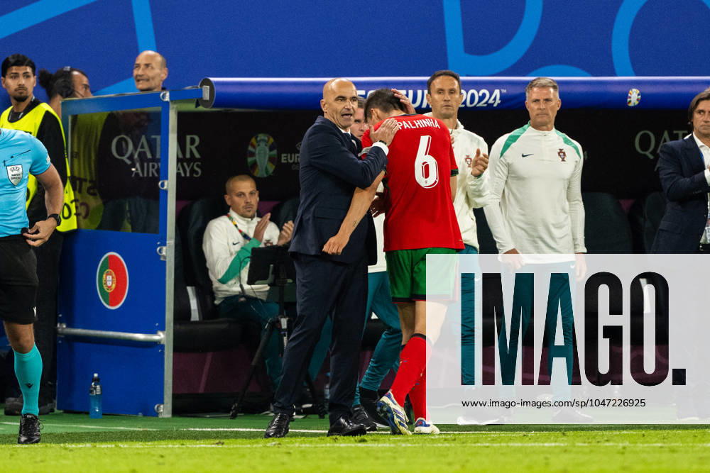 Portugal v France, UEFA EURO, EM, Europameisterschaft,Fussball 2024, Hamburg, Germany Hamburg, Germany. 05th, July 2024. Head coach Roberto Martinez of Portugal seen with Joao Palhinha (6) during the UEFA Euro 2024 quarter final match between Portugal and France at Volksparkstadion in Hamburg. Hamburg Germany
