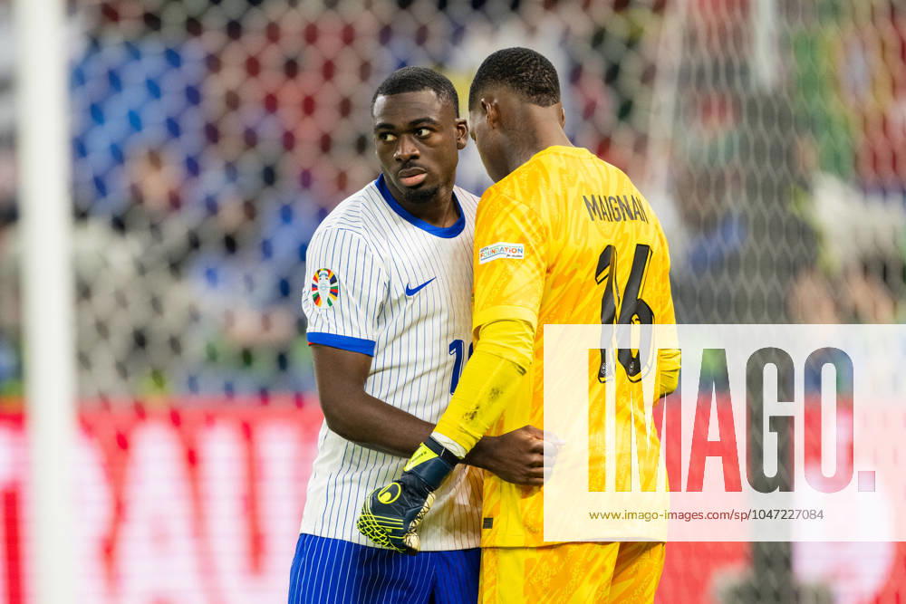 Portugal v France, UEFA EURO, EM, Europameisterschaft,Fussball 2024, Hamburg, Germany Hamburg, Germany. 05th, July 2024. Goalkeeper Mike Maignan (16) of France seen with Youssouf Fofana (19) during the UEFA Euro 2024 quarter final match between Portugal and France at Volksparkstadion in Hamburg. Hamburg Germany