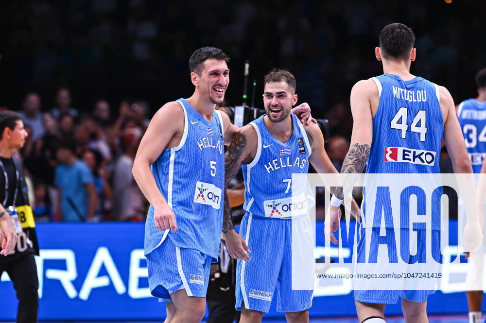 Croatia v Greece - FIBA Olympic Qualifying Tournament 2024 Final 7 Vasilis Toliopoulos, 5 Giannoulis Larentzakis, and 44 Dinos Mitoglou are celebrating the ticket to the Olympic Games, Olympische Spiele, Olympia, OS of Paris 2024 during the FIBA Olympic Qualifying Tournament 2024 Final match between Croatia and Greece at Peace & Friendship Stadium on July 7, 2024, in Piraeus, Greece. Piraeus Greece