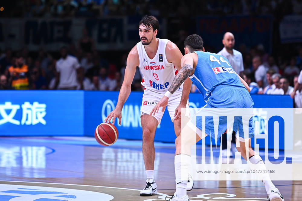 Croatia v Greece - FIBA Olympic Qualifying Tournament 2024 Final Dario Saric of Croatia is competing with Dinos Mitoglou of Greece during the FIBA Olympic Qualifying Tournament 2024 Final match between Croatia and Greece at Peace & Friendship Stadium on July 7, 2024, in Piraeus, Greece. Piraeus Greece