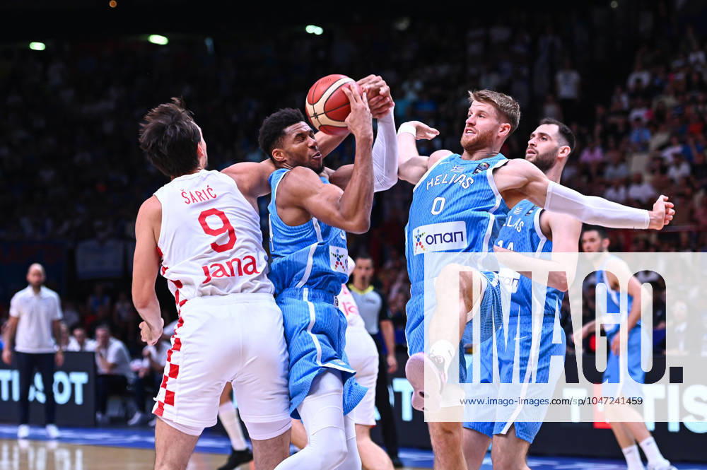 Croatia v Greece - FIBA Olympic Qualifying Tournament 2024 Final Giannis Antetokounmpo is competing with Thomas Walkup of Greece and Dario Saric of Croatia during the FIBA Olympic Qualifying Tournament 2024 Final match between Croatia and Greece at Peace & Friendship Stadium on July 7, 2024, in Piraeus, Greece. Piraeus Greece