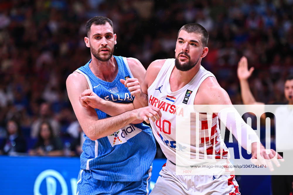 Croatia v Greece - FIBA Olympic Qualifying Tournament 2024 Final 14 Georgios Papagiannis of Greece is competing with 40 Ivica Zubac of Croatia during the FIBA Olympic Qualifying Tournament 2024 Final match between Croatia and Greece at Peace & Friendship Stadium on July 7, 2024, in Piraeus, Greece. Piraeus Greece