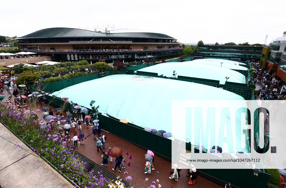 Covers are seen on outside courts as rain falls before the start of play. Wimbledon Tennis Championships, Day 9, The All England Lawn Tennis and Croquet Club, London, UK - 09 Jul 2024