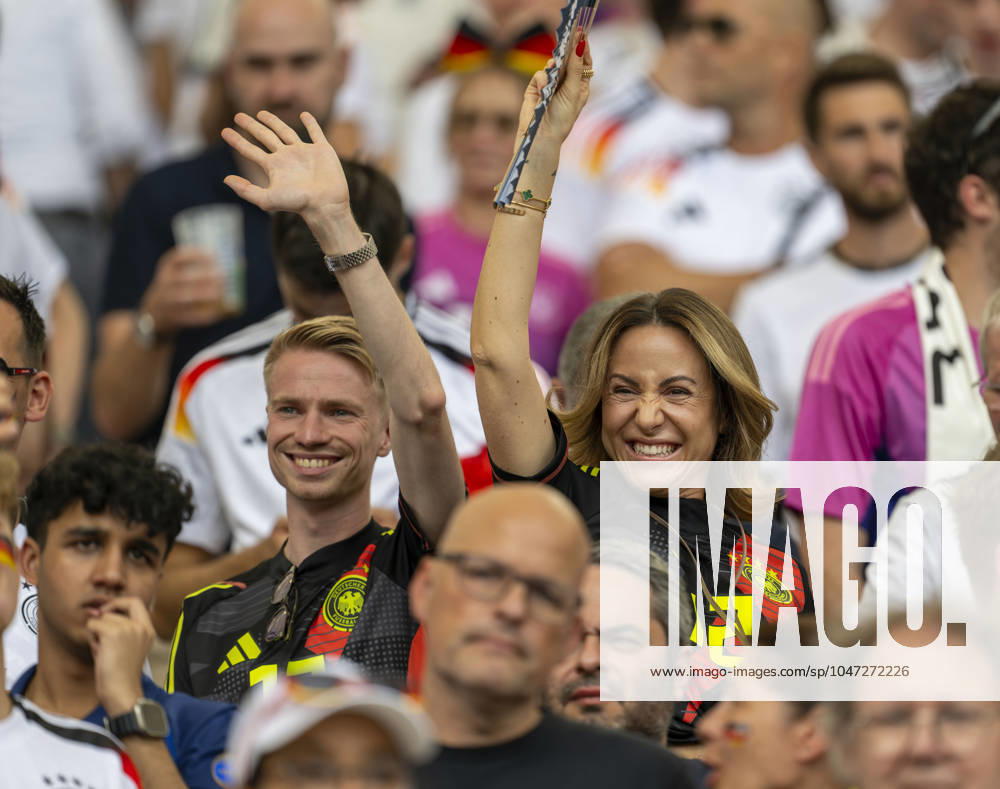 Football UEFA EURO 2024, quarter-finals, Spain Germany, in the Stuttgart Arena Charlotte re , wife of goalkeeper Oliver Baumann Germany in the stands