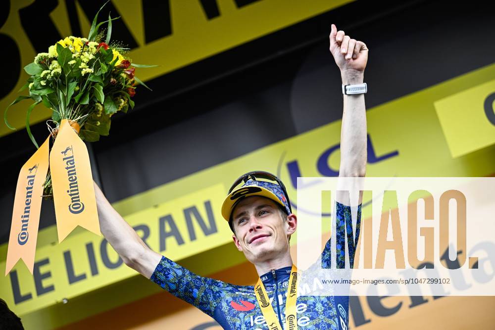 Danish Jonas Vingegaard of Team Visma-Lease a Bike celebrates on the podium after winning stage 11 of the 2024 Tour de France cycling race, from Evaux-les-Bains to Le Lioran, France (211km) on Wednesday 10 July 2024. The 111th edition of the Tour de France starts on Saturday 29 June and will finish in Nice, France on 21 July. JASPERxJACOBS x96197035x