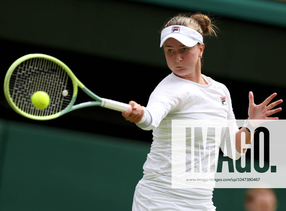 (240713) -- LONDON, July 13, 2024 -- Barbora Krejcikova hits a return during the women s singles final between Barbora Krejcikova of Czech Republic and Jasmine Paolini of Italy at Wimbledon tennis Championship in London, Britain, July 13, 2024. ) (SP)BRITAIN-LONDON-TENNIS-WIMBLEDON--WOMEN S SINGLES-FINAL LixYing