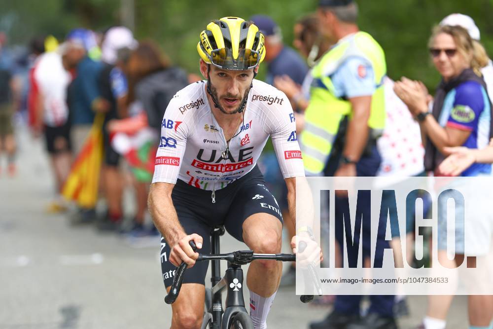 Tour de France 2024 - Stage 14 SAINT-LARY-SOULAN PLA D ADET, FRANCE - JULY 13 : Yates Adam (GBR) of UAE Team Emirates in action during stage 14 of the 111th edition of the Tour de France 2024 cycling race, a stage of 152 kms with start in Pau and finish in Saint-Lary-Soulan Pla d Adet on July 13, 2024 in Saint-Lary-Soulan Pla d Adet, France, 13 07 2024 Saint-Lary-Soulan Pla d Adet France