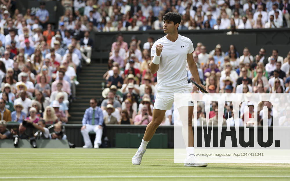 (240714) -- LONDON, July 14, 2024 -- Carlos Alcaraz celebrates scoring during the men s singles final between Carlos Alcaraz of Spain and Novak Djokovic of Serbia at Wimbledon tennis Championship in London, Britain, July 14, 2024. ) (SP)BRITAIN-LONDON-TENNIS-WIMBLEDON-MEN S SINGLES-FINAL HanxYan