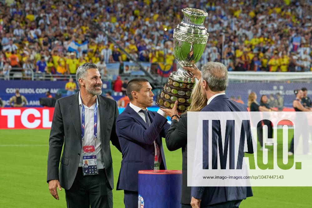 Copa America USA 2024 Argentina vs Colombia - Final Mario Yepes, Oscar Cordoba, Claudio Caniggio and Oscar Ruggeri poses with the Copa America trophy during Final match between Argentina and Colombia as part of CONMEBOL Copa America USA 2024 at Hard Rock Stadium on July 14, 2024 in Miami Gardens, Florida, United States. MIAMI GARDENS FLORIDA UNITED STATES