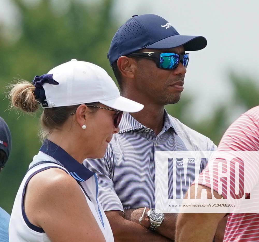 Tiger Woods (R) watches his son Charlie Woods (not pictured) with Amy Connelly, VP of Business Affairs of Tiger Woods Ventures, on the first hole - North Course during the second round of the 2024 U.S. Junior Amateur Championship at Oakland Hills Country Club. Bloomfield Hills USA - ZUMAw109 20240723_fap_w109_005