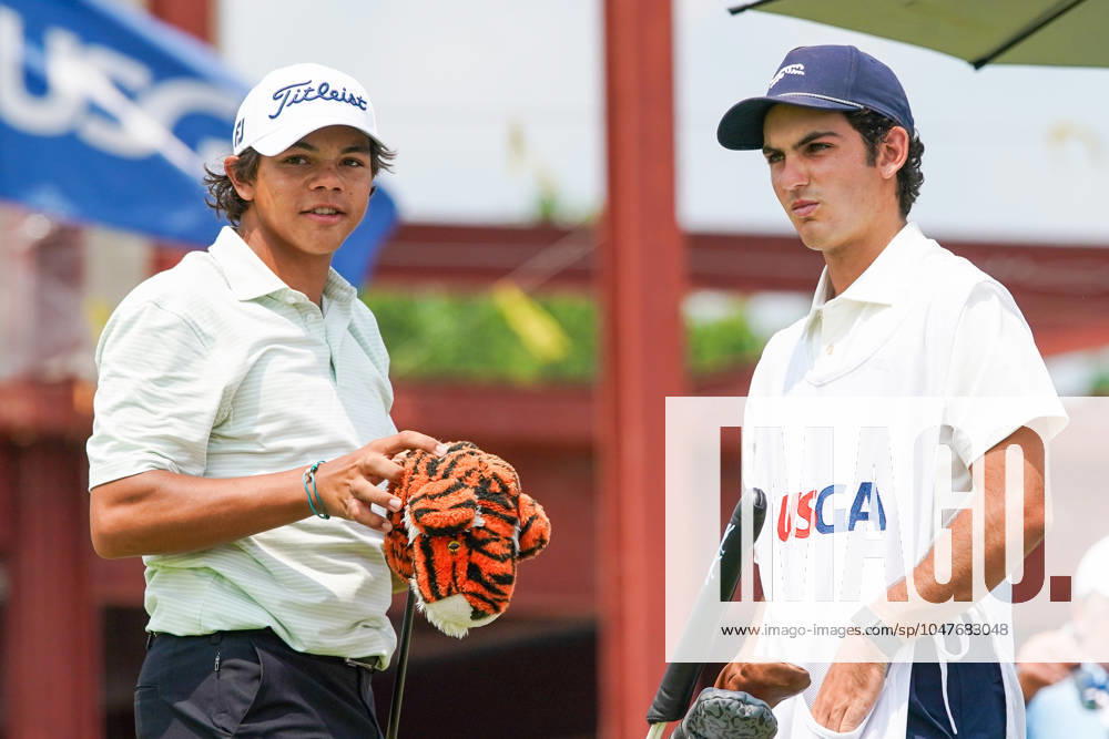 Charlie Woods (USA)(L) and his caddie Luke Wise wait on the 1st hole - North Course during the second round of the 2024 U.S. Junior Amateur Championship at Oakland Hills Country Club. Bloomfield Hills USA - ZUMAw109 20240723_fap_w109_008