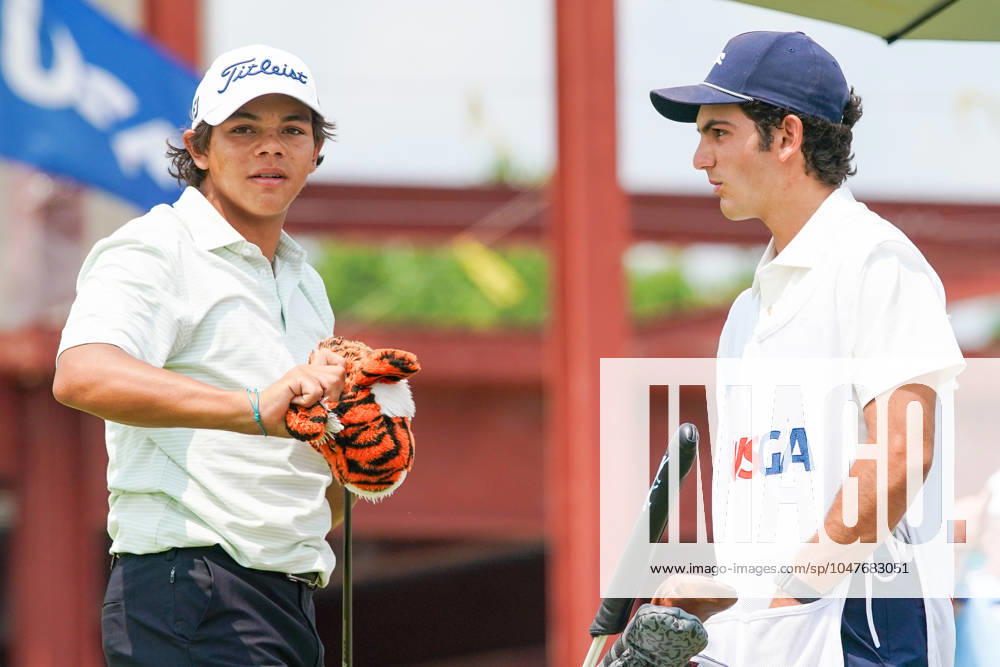 Charlie Woods (USA)(L) and his caddie Luke Wise wait on the 1st hole - North Course during the second round of the 2024 U.S. Junior Amateur Championship at Oakland Hills Country Club. Bloomfield Hills USA - ZUMAw109 20240723_fap_w109_011