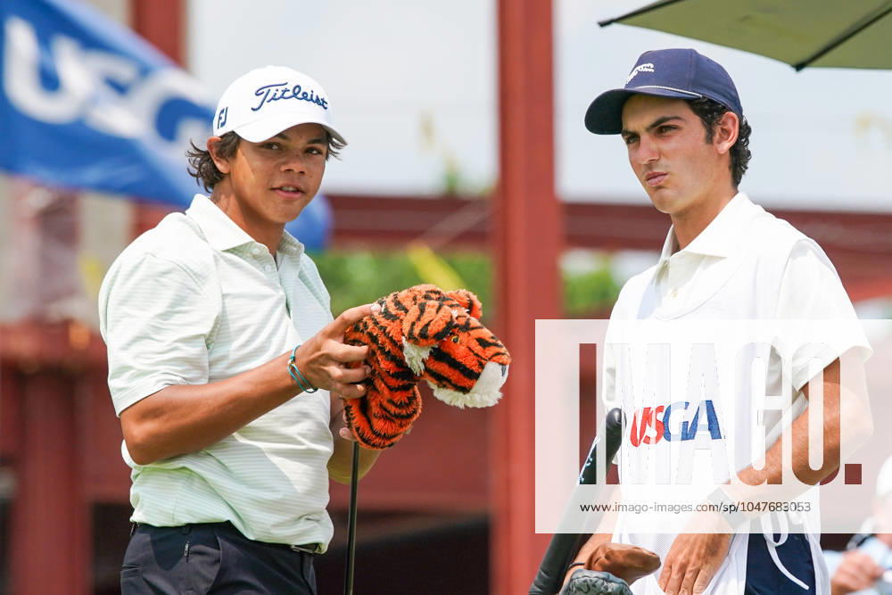Charlie Woods (USA)(L) and his caddie Luke Wise wait on the 1st hole - North Course during the second round of the 2024 U.S. Junior Amateur Championship at Oakland Hills Country Club. Bloomfield Hills USA - ZUMAw109 20240723_fap_w109_012