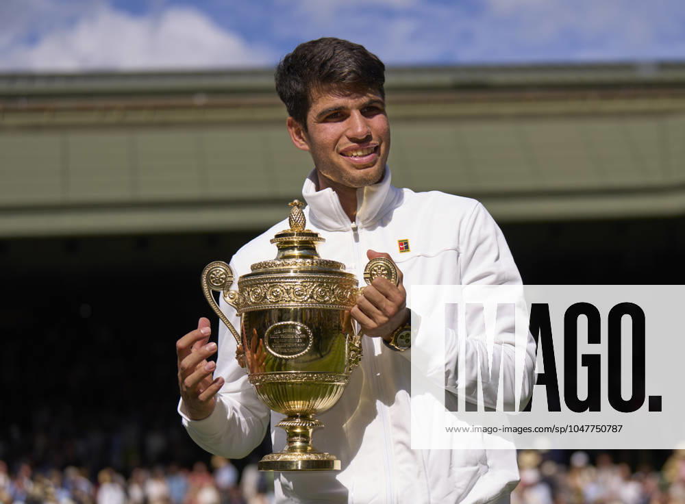 Wimbledon Championships 2024 Carlos Alcaraz (ESP) with the trophy, celebrates winning against Novak Djokovic (SRB) in the mens final on centre court at the 2024 Wimbledon Championships at The All England Club, London, United Kingdom , 14 July 2024, Credit:Peter van den Berg Avalon United Kingdom, England, London, All England Lawn Tennis and Croquet Club