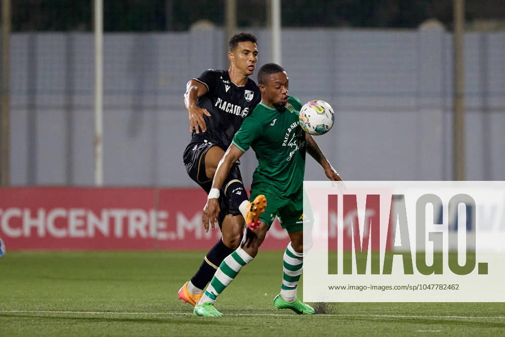 Floriana v Vitoria SC - UEFA Europa Conference League 2024 2025, Second Qualifying Round, 1st Leg Kemar Reid (front) of Floriana is being closely challenged by Baio Alberto (back) of Vitoria SC during the UEFA Europa Conference League, Second Qualifying Round, 1st Leg soccer match between Floriana and Vitoria SC at the Centenary Stadium in Ta Qali, Malta, on July 25, 2024. Ta Qali Attard Malta
