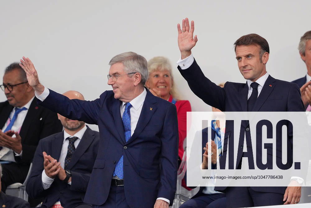 (240726) -- PARIS, July 26, 2024 -- International Olympic Committee (IOC) President Thomas Bach (L) and French President Emmanuel Macron attend the opening ceremony of the Paris 2024 Olympic Games, Olympische Spiele, Olympia, OS in Paris, France, July 26, 2024. ) (PARIS2024) FRANCE-PARIS-OLY-OPENING CEREMONY WangxYuguo