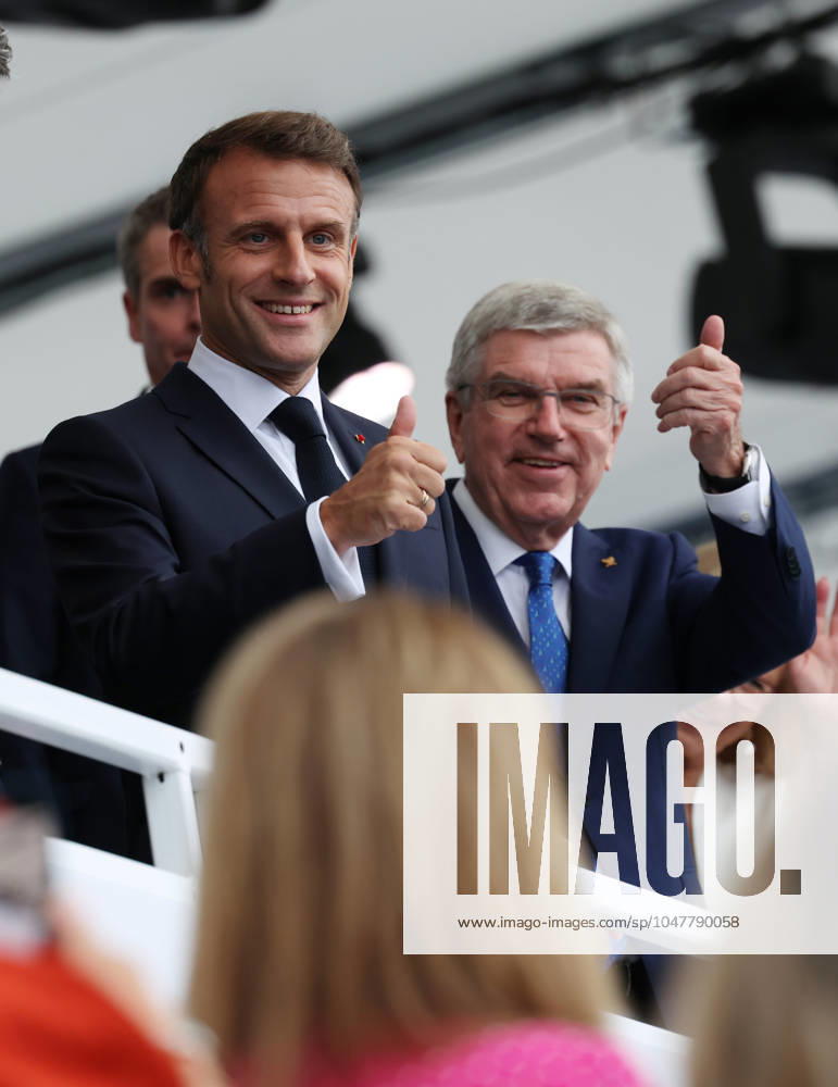 (240726) -- PARIS, July 26, 2024 -- International Olympic Committee (IOC) President Thomas Bach (R) and French President Emmanuel Macron are seen during the opening ceremony of the Paris 2024 Olympic Games, Olympische Spiele, Olympia, OS in Paris, France, July 26, 2024. ) (PARIS2024) FRANCE-PARIS-OLY-OPENING CEREMONY GaoxJing