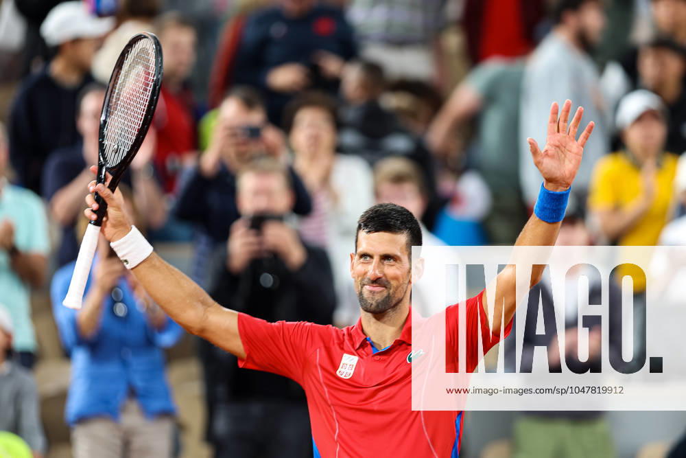FRA, Olympic Games Paris 2024, Tennis Men, 27 07 2024 Djokovic Novak SRB vs Ebden Matthew AUS Djokovic Novak SRB defeats Ebden Matthew AUS Djokovic raises his arms in the air FRA, Olympic Games Paris 2024, Tennis 27 07 2024 Paris