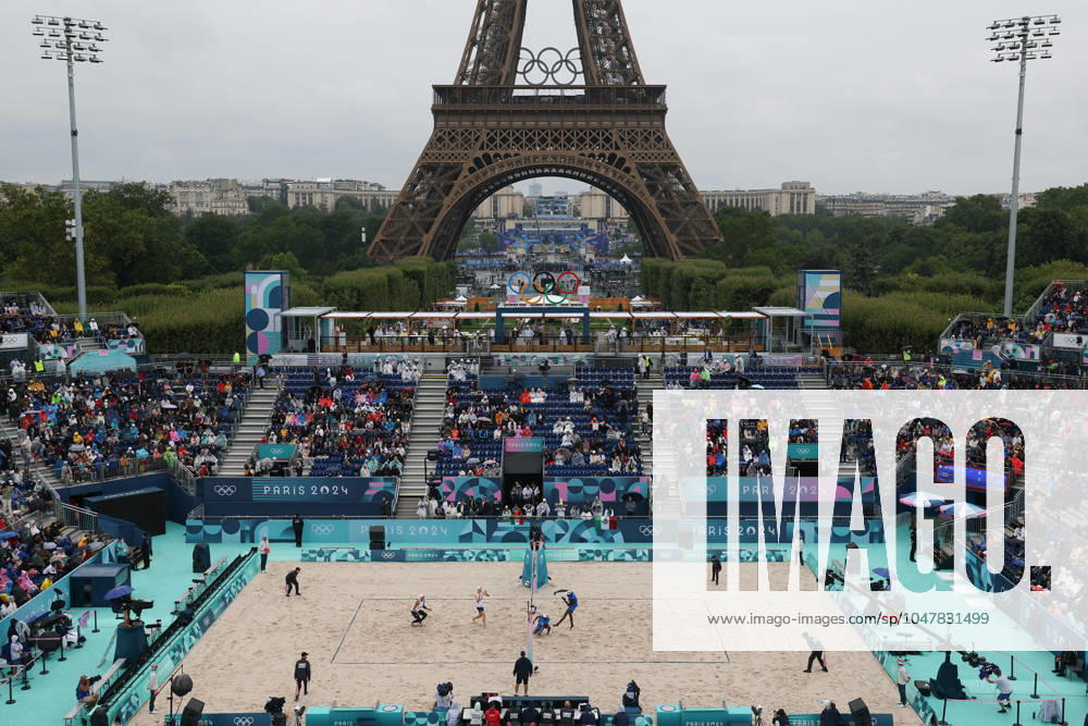 (240727) -- PARIS, July 27, 2024 -- Noslen Diaz Amaro Jorge Luis Alayo Moliner of Cuba and Miles Partain Andrew Benesh of the United States compete during the men s pool D Beach volleyball, Beachvolleyball match between the United States and Cuba at the Paris 2024 Olympic Games, Olympische Spiele, Olympia, OS in Paris, France, on July 27, 2024. Huang Zongzhi) (PARIS2024)FRANCE-PARIS-BEACH VOLLEYBALL-MEN S PRELIMINARY huangzongzhi