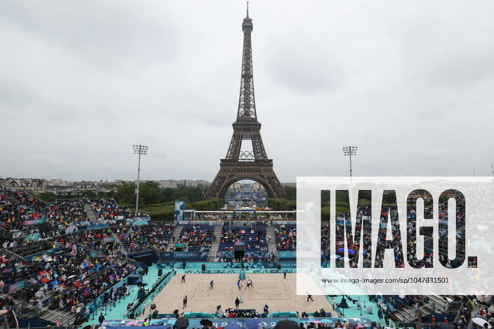 (240727) -- PARIS, July 27, 2024 -- Noslen Diaz Amaro Jorge Luis Alayo Moliner of Cuba and Miles Partain Andrew Benesh of the United States compete during the men s pool D Beach volleyball, Beachvolleyball match between the United States and Cuba at the Paris 2024 Olympic Games, Olympische Spiele, Olympia, OS in Paris, France, on July 27, 2024. Huang Zongzhi) (PARIS2024)FRANCE-PARIS-BEACH VOLLEYBALL-MEN S PRELIMINARY huangzongzhi